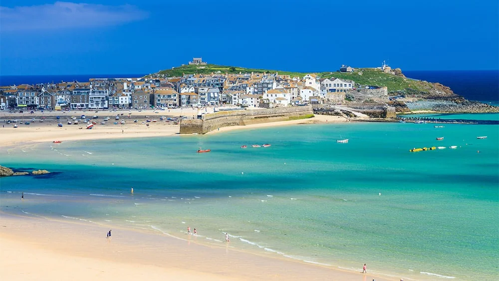 St Ives harbour and beach on a clear day